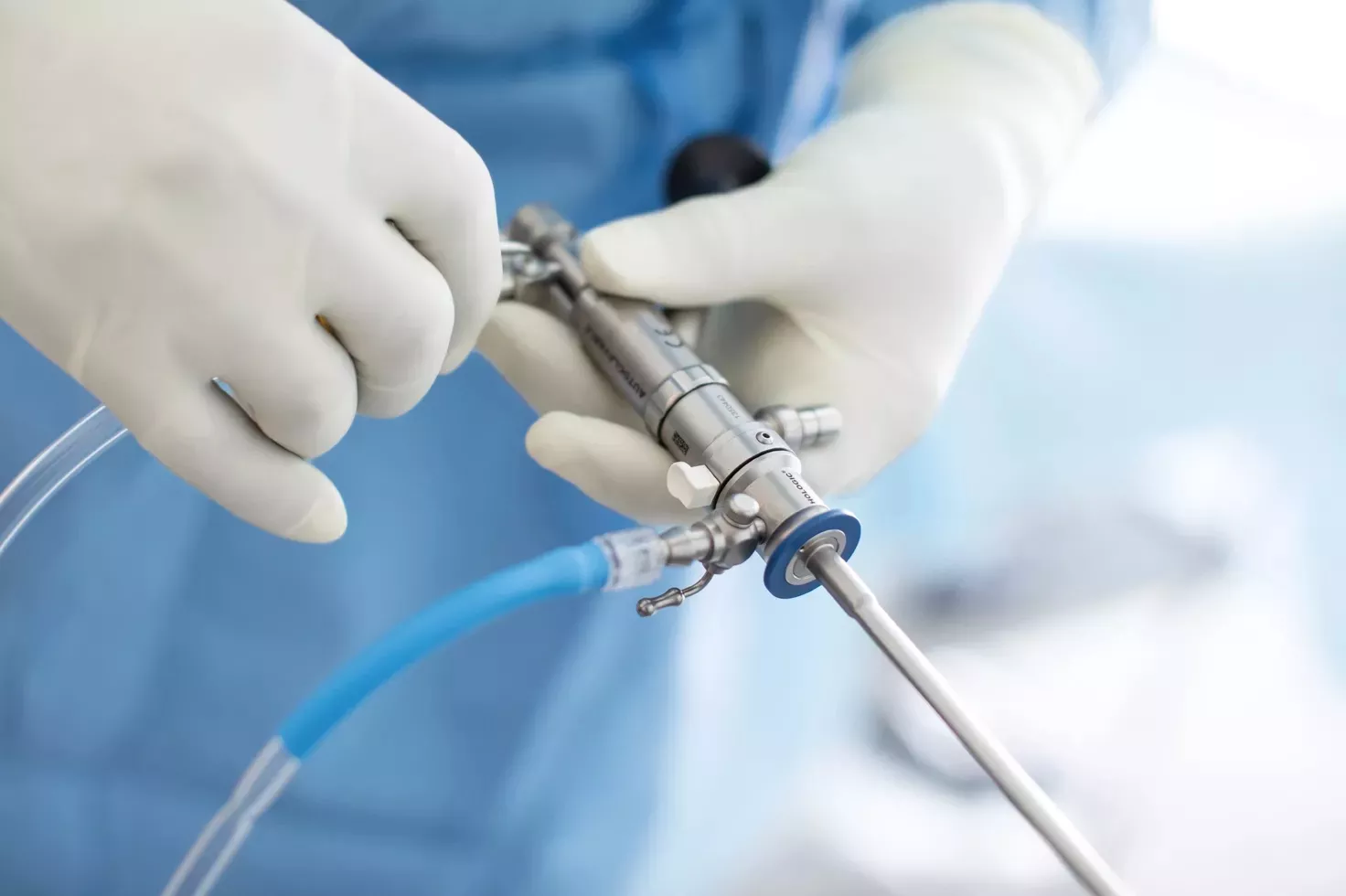 Clinician is holding a hysteroscopic device